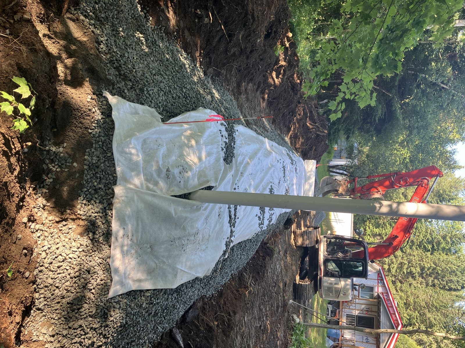 Vue d'ensemble du chantier de drainage résidentiel à Tring-Jonction