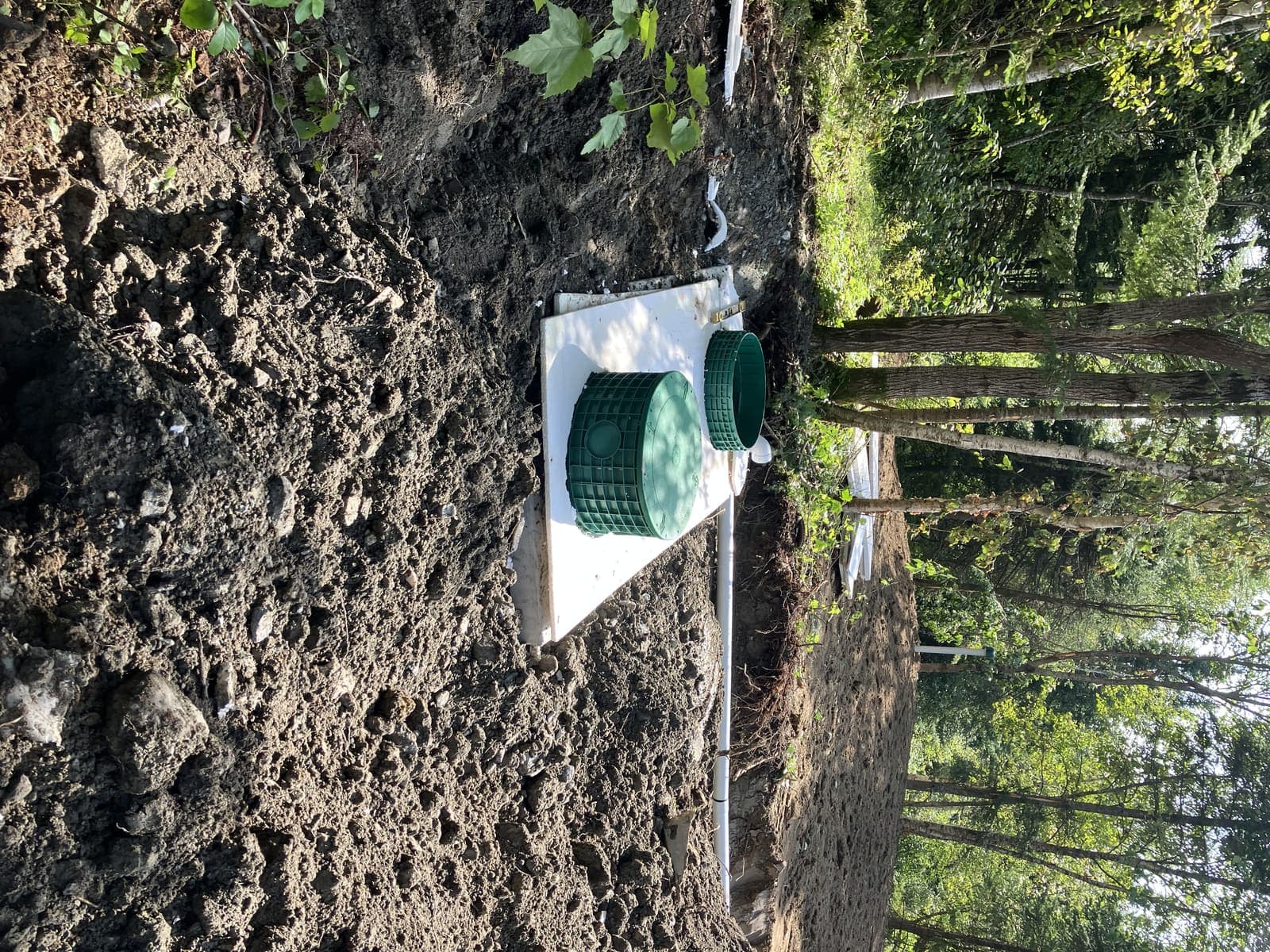 Travaux de terrassement autour d'une nouvelle fosse septique à Thetford Mines
